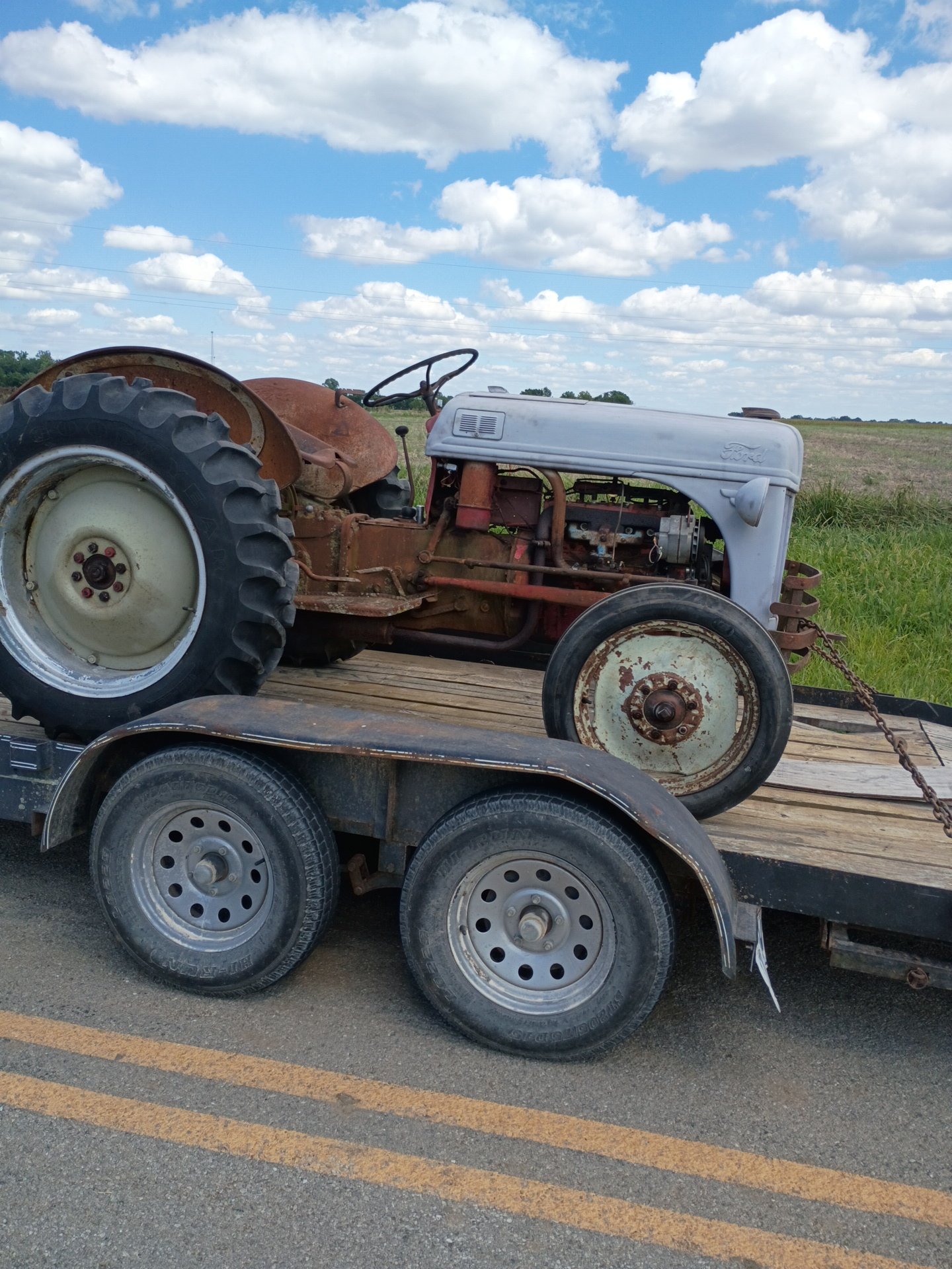 Just thought I'd start a new thread.. 8n pulling tractor.. special ...